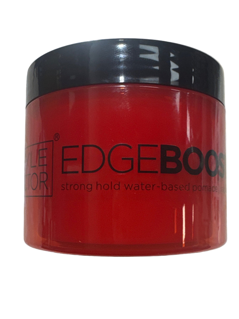 Red hair product container with black lid on a marble surface